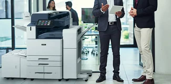 Image shows picture of Xerox AltaLink 8200 Series Multifunction Color Printer, MFP, in an office setting.